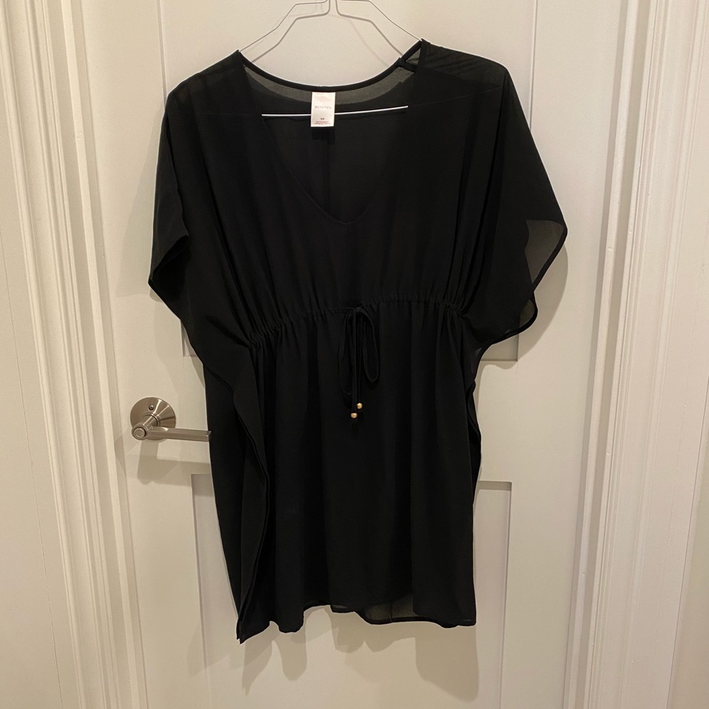 Women’s black swim suit cover up